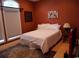 Bedroom with traditional décor, featuring an area rug and a side table with a lamp at 4744 Bucks Bluff Dr., North Myrtle Beach, SC 29582