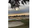 Scenic view of the golf course, featuring a sand trap and waterfront at 4744 Bucks Bluff Dr., North Myrtle Beach, SC 29582