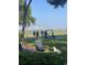 Relaxing golf course views with a golf cart, people, and a dog at 4744 Bucks Bluff Dr., North Myrtle Beach, SC 29582