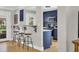 Kitchen view with bar seating and a view into the modern kitchen at 485 Waterford Dr., Georgetown, SC 29440
