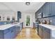 Bright modern kitchen with stainless appliances, subway tile backsplash, and plenty of cabinet storage at 485 Waterford Dr., Georgetown, SC 29440