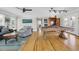 Bright and airy living room featuring hardwood floors, a pool table, and stylish furnishings at 485 Waterford Dr., Georgetown, SC 29440