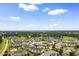 Community aerial view of lush green golf course and manicured landscapes on a sunny day at 4872 Dahlia Ct. # 305, Myrtle Beach, SC 29577