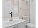 Bathroom featuring a white vanity and a toilet, with a doorway visible to other rooms at 4872 Dahlia Ct. # 305, Myrtle Beach, SC 29577