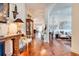 Spacious hallway with hardwood floors, elegant archways, and decorative accents at 492 Grand Cypress Way, Murrells Inlet, SC 29576
