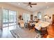 A spacious living room features neutral furniture, hardwood floors, and natural light at 492 Grand Cypress Way, Murrells Inlet, SC 29576