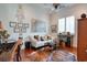 Cozy living room with hardwood floors, a comfortable sofa, and charming decor at 492 Grand Cypress Way, Murrells Inlet, SC 29576