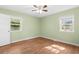 Cozy bedroom with green walls, natural light and hardwood floors at 5 Dogwood St., Hemingway, SC 29554