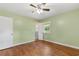 Neutral bedroom features green walls, natural light and hardwood floors at 5 Dogwood St., Hemingway, SC 29554