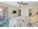 Comfortable bedroom with a ceiling fan, access to a balcony, and en-suite at 5515 North Ocean Blvd. # 308, Myrtle Beach, SC 29577