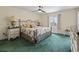 Relaxing bedroom with a decorative bed frame, carpet flooring, and natural light at 5515 North Ocean Blvd. # 308, Myrtle Beach, SC 29577