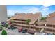 Exterior view of beachside condo with parking, palm trees, and ocean views at 5515 North Ocean Blvd. # 308, Myrtle Beach, SC 29577