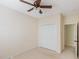 Cozy bedroom featuring a ceiling fan, neutral walls, carpet flooring and closet with plenty of storage space at 56 Willowbend Dr., Murrells Inlet, SC 29576