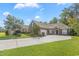 Charming all brick home boasts an attached two car garage and a well manicured lawn with mature trees and shrubbery at 56 Willowbend Dr., Murrells Inlet, SC 29576