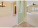 Bright living room with modern color scheme, decorative columns and carpeted floor at 56 Willowbend Dr., Murrells Inlet, SC 29576
