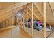 Unfinished attic shows wooden supports and plywood flooring for customizable storage and expansion potential at 567 Hickman St., Myrtle Beach, SC 29575