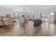 Bright and airy clubhouse featuring modern furniture, hardwood floors, and large windows with scenic views at 567 Hickman St., Myrtle Beach, SC 29575