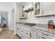 Well-appointed kitchen with granite countertops, stainless steel appliances, and ample cabinet space for storage at 567 Hickman St., Myrtle Beach, SC 29575