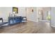 Elegant living area featuring a bar, sleek furniture, and wood-look flooring at 567 Hickman St., Myrtle Beach, SC 29575