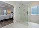 Main bathroom showcasing a glass-enclosed shower and access to the main bedroom at 567 Hickman St., Myrtle Beach, SC 29575
