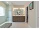 Main bathroom with double vanity, walk-in shower, and a neutral color scheme at 567 Hickman St., Myrtle Beach, SC 29575