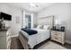 This bedroom features a comfortable bed, a window, and tasteful decor at 5826 Cremona Dr., Myrtle Beach, SC 29577