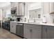 Bright kitchen featuring stainless steel appliances, subway tile backsplash, and gray shaker style cabinetry at 5826 Cremona Dr., Myrtle Beach, SC 29577