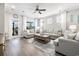 Spacious living room with hardwood floors and a ceiling fan at 5826 Cremona Dr., Myrtle Beach, SC 29577