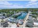 Scenic aerial view showcasing waterfront homes along a peaceful canal in a vibrant coastal community at 6001-R11 S Kings Hwy., Myrtle Beach, SC 29575