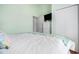Bedroom features a queen bed with bright patterned accents, creating a cozy and stylish space at 6001-R11 S Kings Hwy., Myrtle Beach, SC 29575