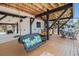 The covered deck features comfortable seating, creating an inviting outdoor space for relaxation and entertainment at 6001-R11 S Kings Hwy., Myrtle Beach, SC 29575