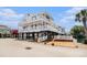 Beautiful multi-level beach house featuring multiple decks and ample outdoor living space on the water at 6001-R11 S Kings Hwy., Myrtle Beach, SC 29575