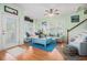 Charming living room with light green walls, coastal decor, and comfortable seating arrangements, perfect for relaxation at 6001-R11 S Kings Hwy., Myrtle Beach, SC 29575