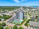 Panoramic aerial view showcasing condo, pool, tennis court, and surrounding city skyline and landscapes at 601 Mitchell Dr. # 607, Myrtle Beach, SC 29577