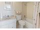 Clean, bright bathroom with a shower-tub combination, white fixtures, and tiled floor at 601 Mitchell Dr. # 607, Myrtle Beach, SC 29577