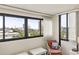Bedroom view features large windows with an amusement park and skyline in the distance at 601 Mitchell Dr. # 607, Myrtle Beach, SC 29577