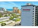 A view of the Holiday Towers building with the shoreline in the distance at 601 Mitchell Dr. # 607, Myrtle Beach, SC 29577