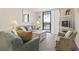 Inviting living room with comfortable seating, stylish decor, and balcony access at 601 Mitchell Dr. # 607, Myrtle Beach, SC 29577