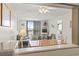 Inviting living room with access to balcony and dining area at 601 Mitchell Dr. # 607, Myrtle Beach, SC 29577