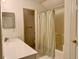 Well-maintained bathroom with a white vanity, and a shower-tub combination at 62 4 Rye Grass Ln. # 4, Pawleys Island, SC 29585