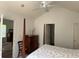 Bright bedroom with a ceiling fan, featuring light walls, and access to an ensuite bathroom at 62 4 Rye Grass Ln. # 4, Pawleys Island, SC 29585