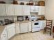 Functional kitchen featuring ample white cabinetry, countertops, and modern appliances at 62 4 Rye Grass Ln. # 4, Pawleys Island, SC 29585