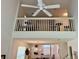 Open-concept living area with vaulted ceilings and a bright, airy loft space above at 62 4 Rye Grass Ln. # 4, Pawleys Island, SC 29585