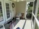 Charming screened porch with seating and decorative elements, creating a cozy outdoor space at 62 4 Rye Grass Ln. # 4, Pawleys Island, SC 29585