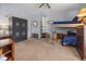 Cozy bedroom with bunk beds, a ceiling fan, and neutral colored walls at 6210 Blynn Dr., Myrtle Beach, SC 29572