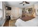 Neutral bedroom featuring a love seat, flat screen television and dresser at 6210 Blynn Dr., Myrtle Beach, SC 29572