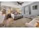 Cozy bedroom with a metal frame bed, neutral tones, and a plush rug at 6210 Blynn Dr., Myrtle Beach, SC 29572