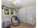 Spacious bedroom with double closets, neutral carpet and walls and a ceiling fan at 6210 Blynn Dr., Myrtle Beach, SC 29572