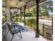 Inviting front porch with outdoor seating, plants, and decorative elements at 6210 Blynn Dr., Myrtle Beach, SC 29572