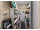 Storage room complete with shelves and a washing machine at 6210 Blynn Dr., Myrtle Beach, SC 29572